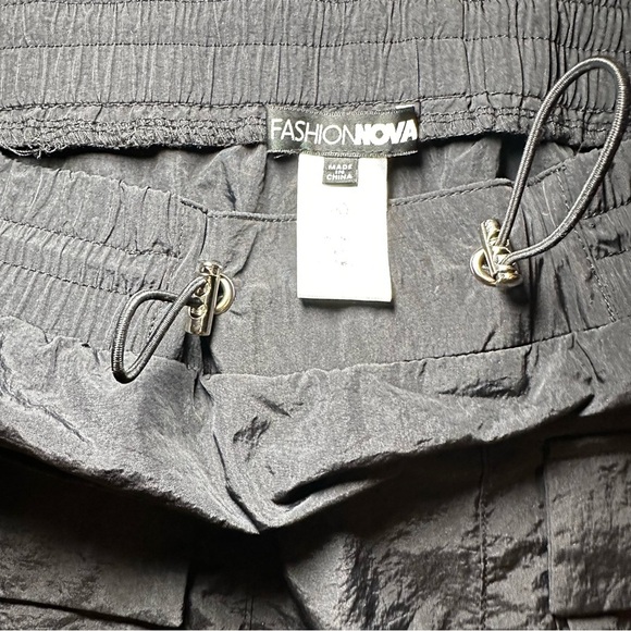 Fashion Nova Sleek Black Mini Skirt - Picture 10 of 10